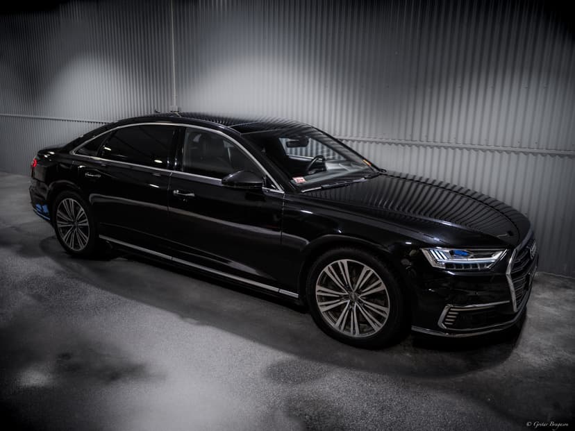 Black Audi A8L luxury sedan from the One Luxury chauffeur fleet