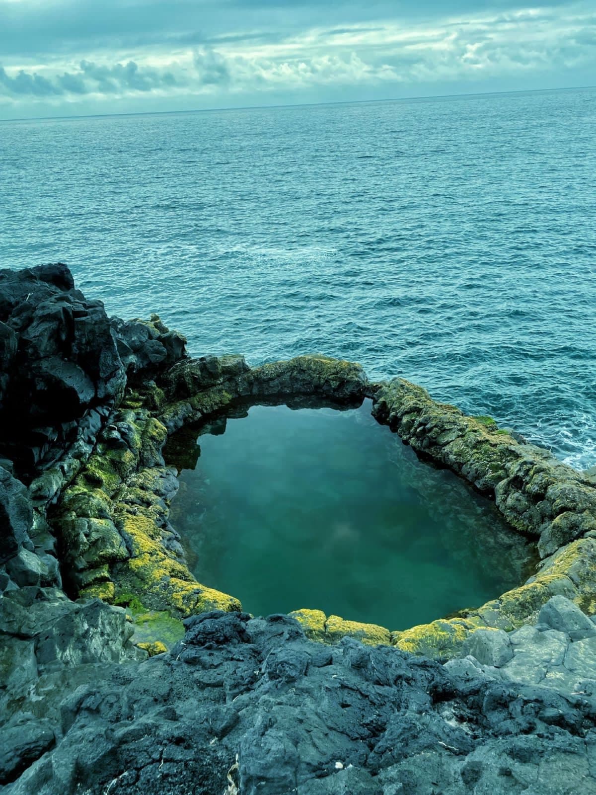 Brimketill natural lava rock pool at the edge of the Atlantic on the Reykjanes coast