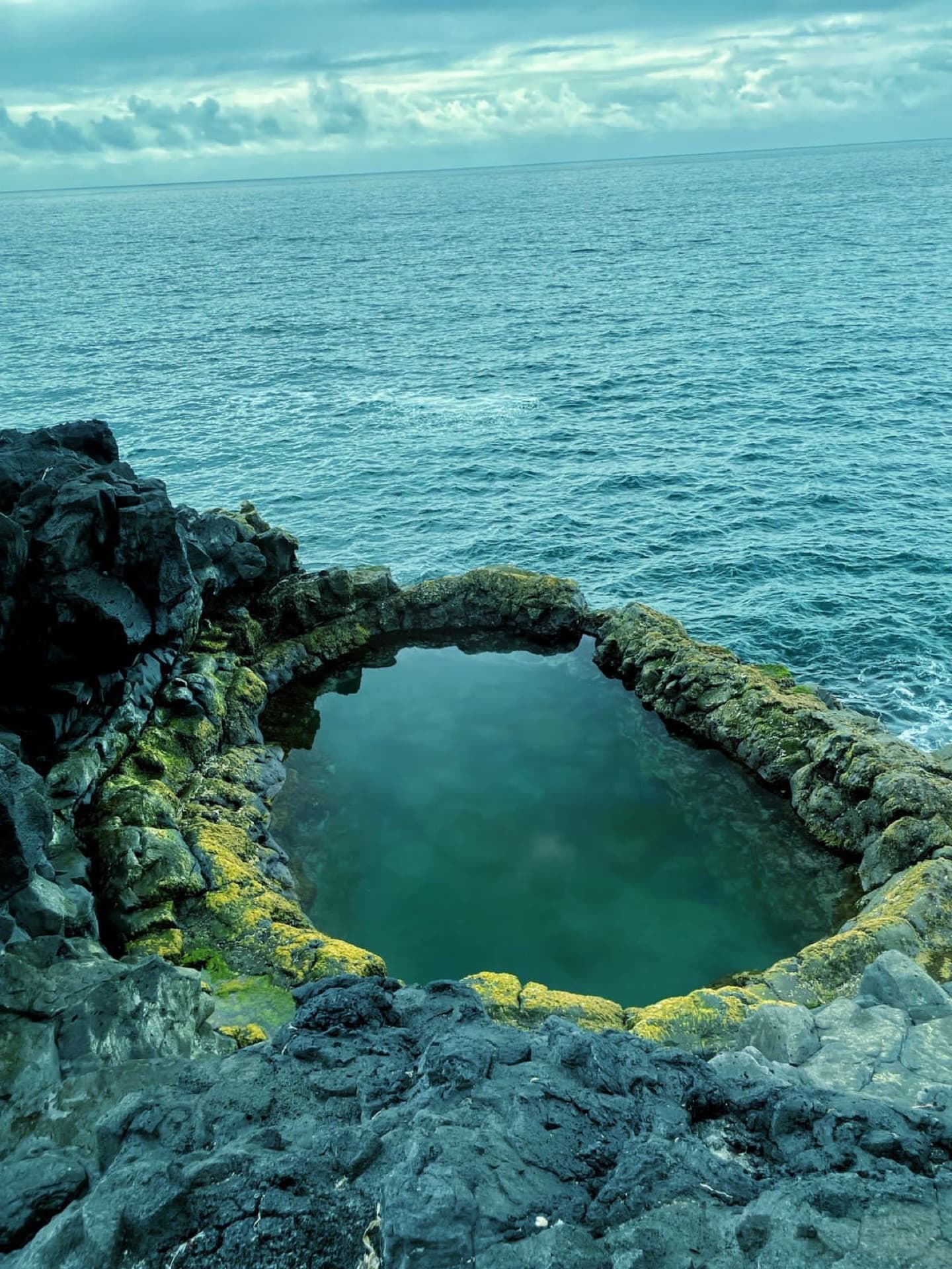 Brimketill natural lava rock pool at the edge of the Atlantic on the Reykjanes coast